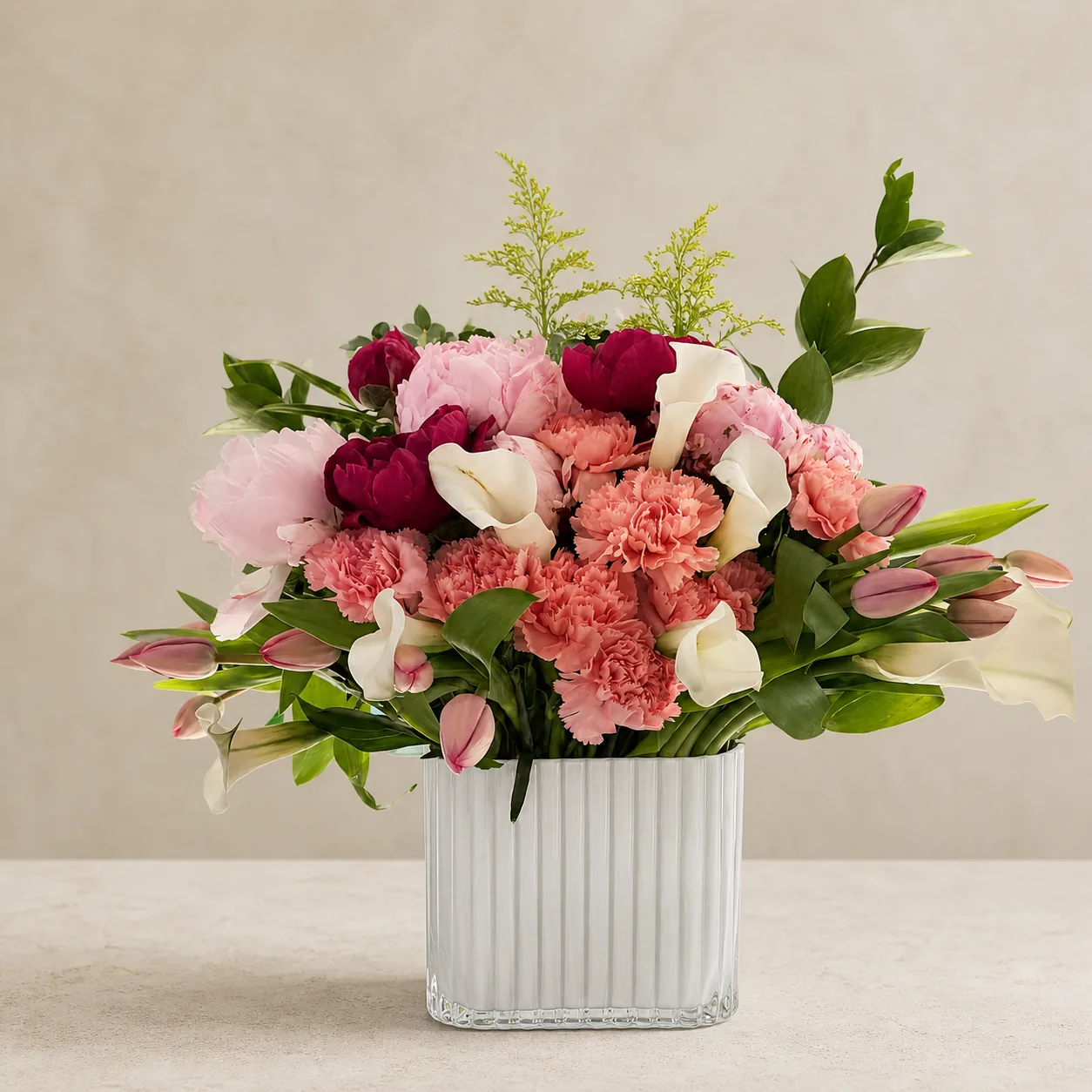 Pink and burgundy floral arrangement